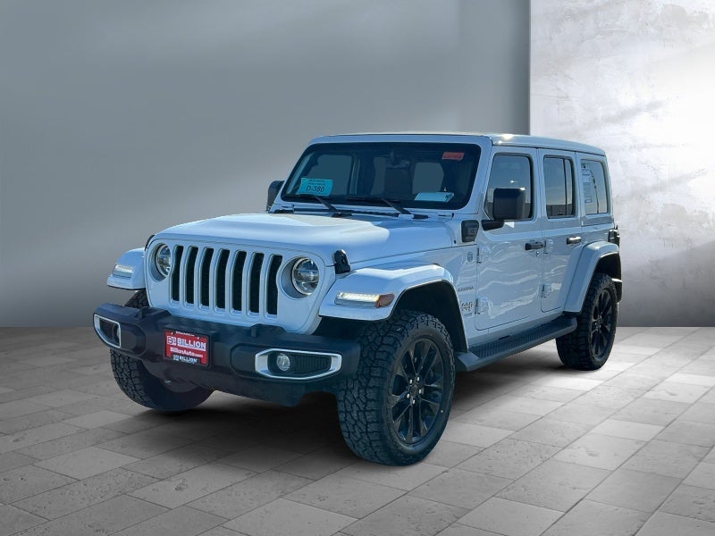 2021 Jeep Wrangler 4xe Unlimited Sahara in White — front three-quarter view