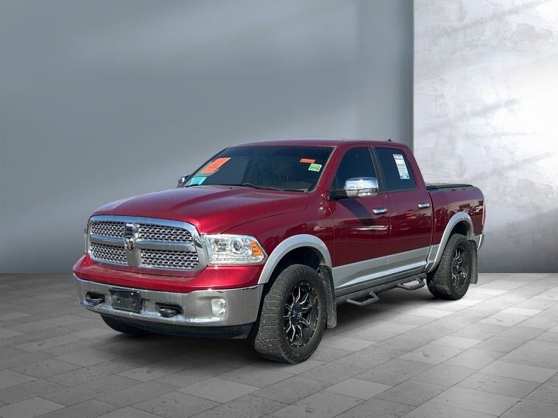 2014 RAM 1500 Laramie in Red — front three-quarter view