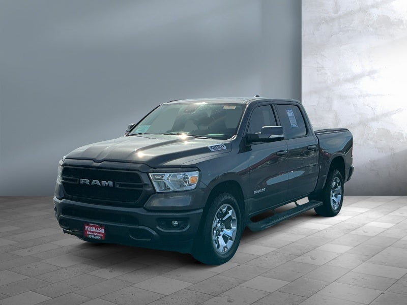 2021 RAM 1500 Big Horn in Grey — front three-quarter view