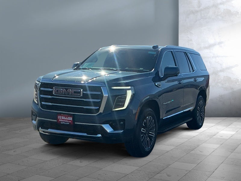 2026 GMC Yukon Elevation in Downpour Metallic — front three-quarter view