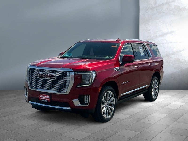 2022 GMC Yukon Denali in Cayenne Red Tintcoat — front three-quarter view