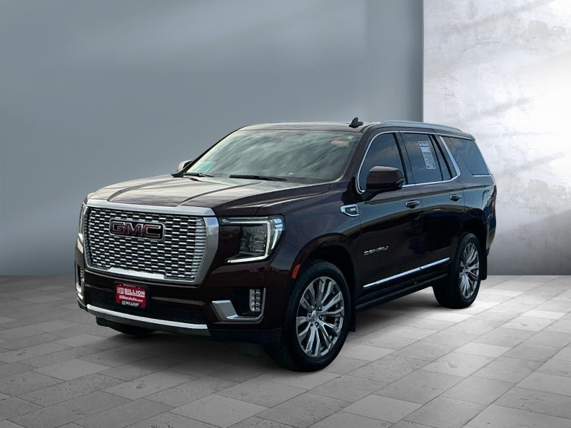 2022 GMC Yukon Denali in Redwood Metallic — front three-quarter view