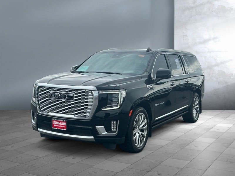 2023 GMC Yukon XL Denali in Onyx Black — front three-quarter view