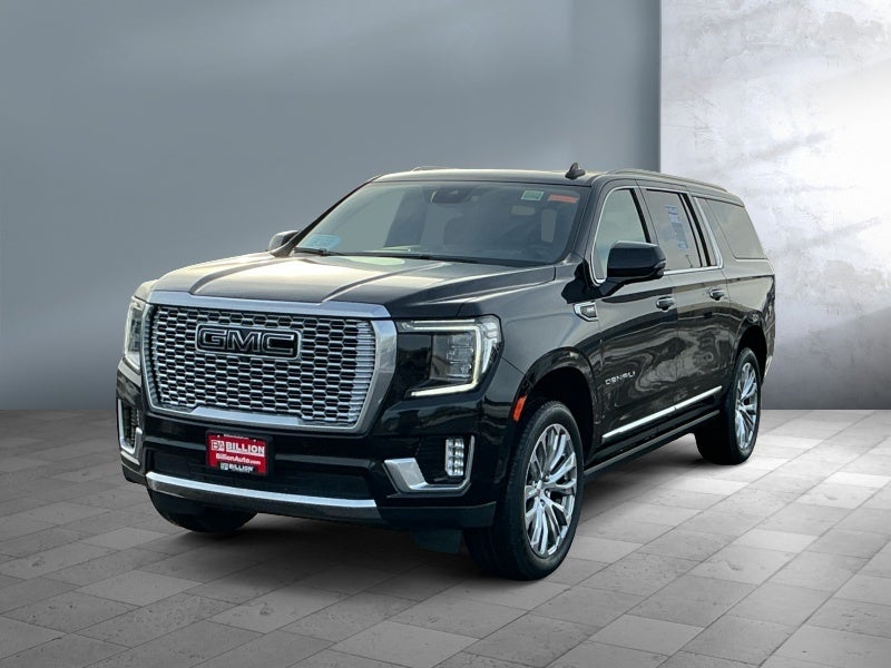 2023 GMC Yukon XL Denali in Onyx Black — front three-quarter view
