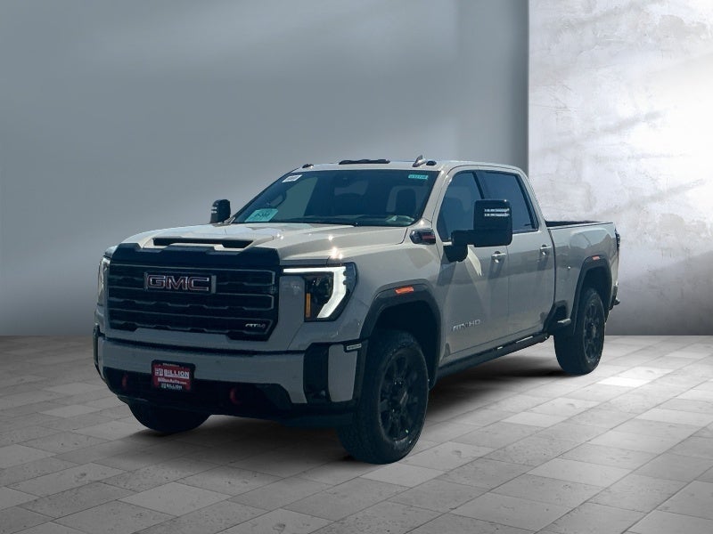 2026 GMC Sierra 2500 HD AT4 in Coastal Dune — front three-quarter view