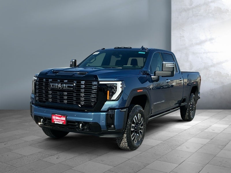2026 GMC Sierra 3500 HD Denali Ultimate in Downpour Metallic — front three-quarter view