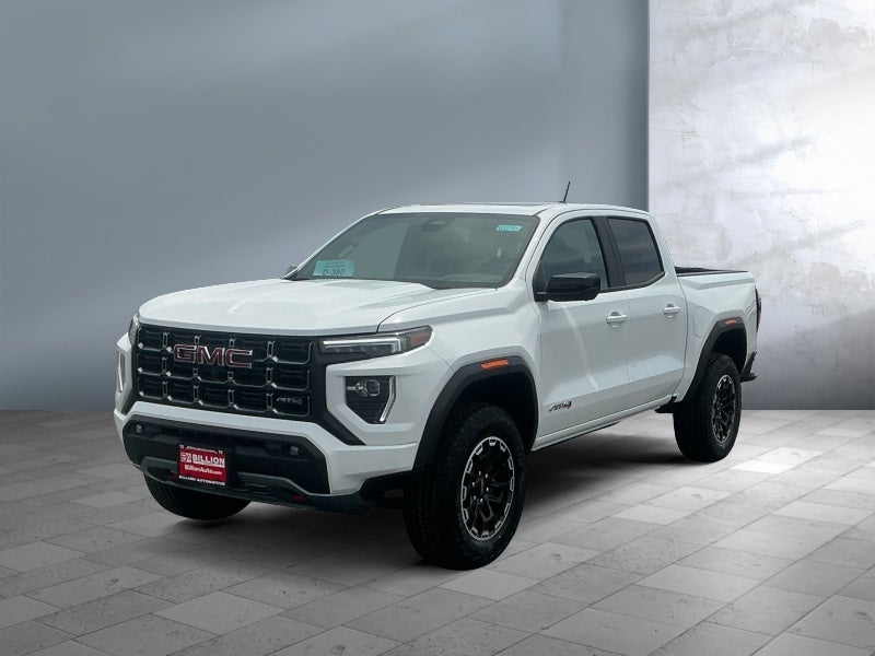 2026 GMC Canyon AT4 in Summit White — front three-quarter view