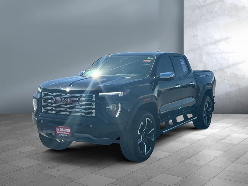 2025 GMC Canyon Denali in Onyx Black — front three-quarter view