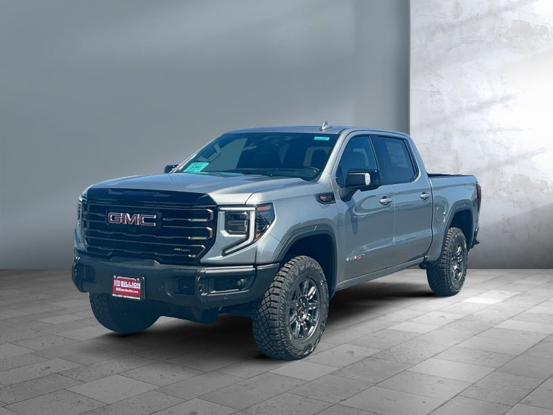 2026 GMC Sierra 1500 AT4X in Sterling Metallic — front three-quarter view