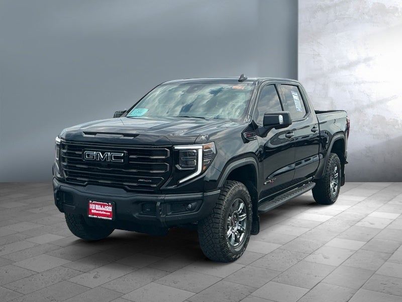 2026 GMC Sierra 1500 AT4X in Onyx Black — front three-quarter view