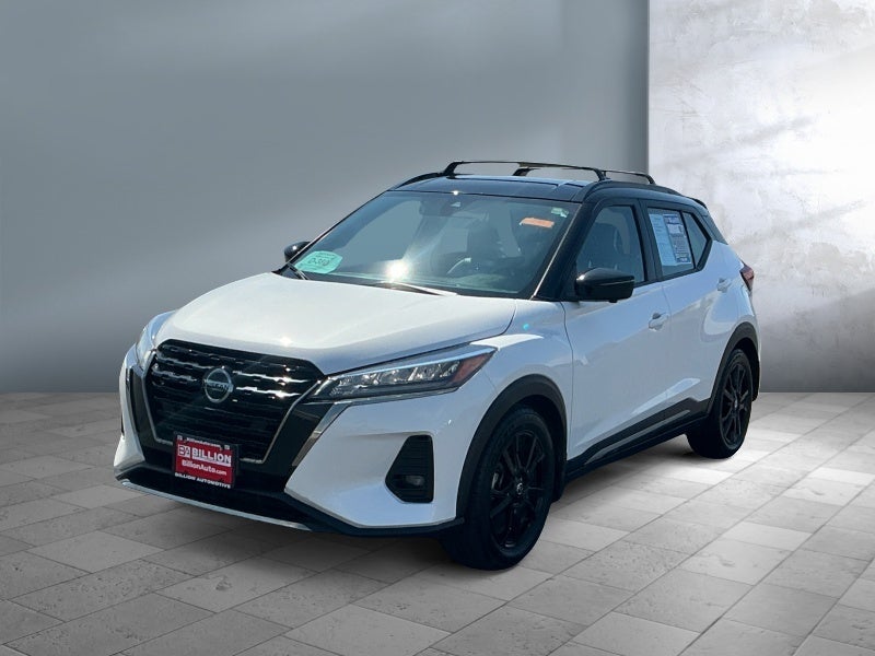 2021 Nissan Kicks SR in White — front three-quarter view