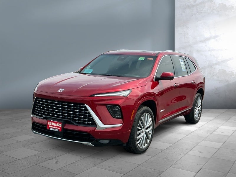 2026 Buick Enclave Avenir in Cherry Red Tintcoat — front three-quarter view