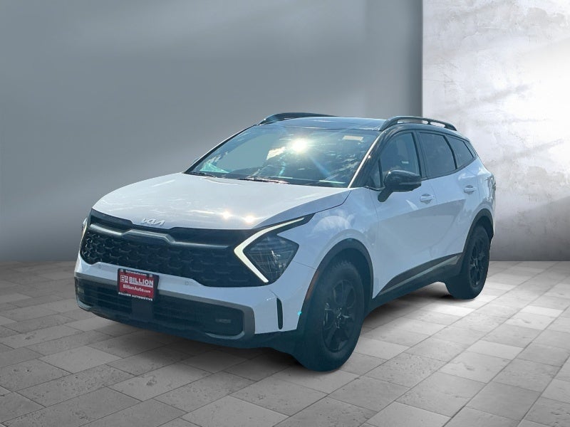 2024 Kia Sportage X-Pro Prestige in White — front three-quarter view